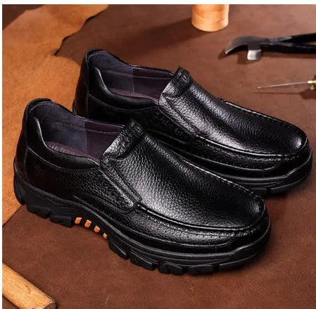 Men's black and brown leather business casual shoes with rubber soles.