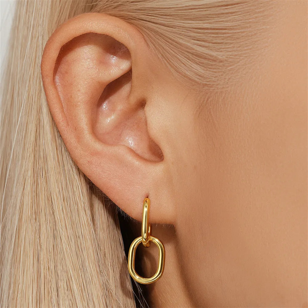 Brass diamond earclip earrings in geometric circular design with gold electroplated finish