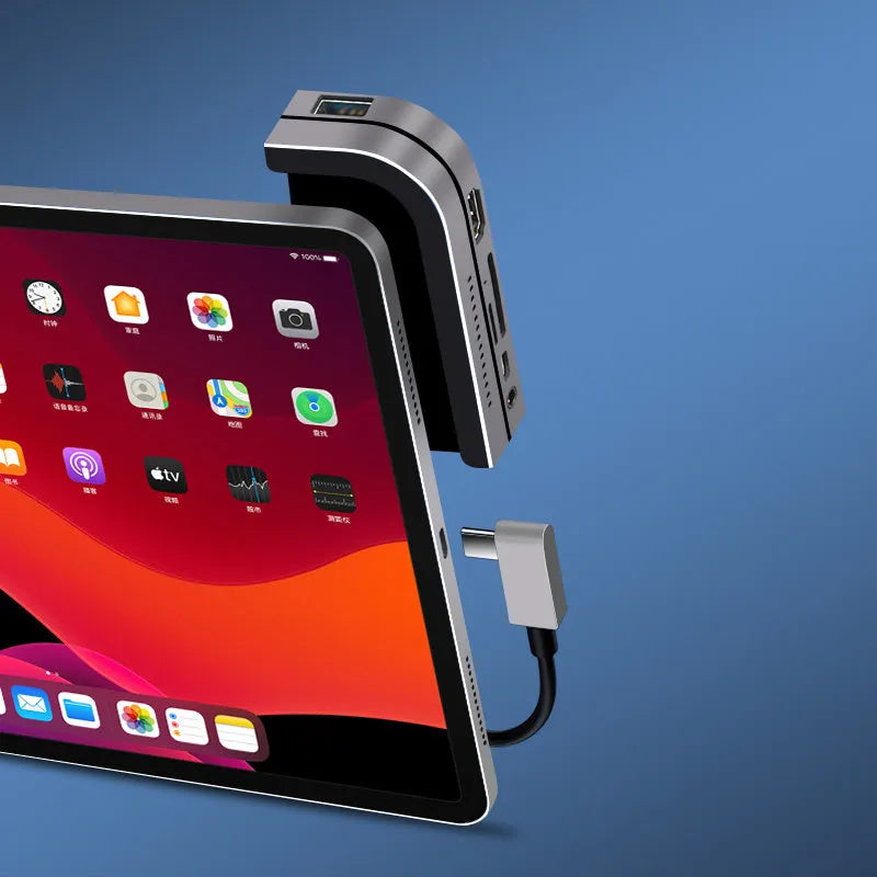 Silver aluminium grey USB-C 6-in-1 docking station for iPad Pro models with multiple ports.