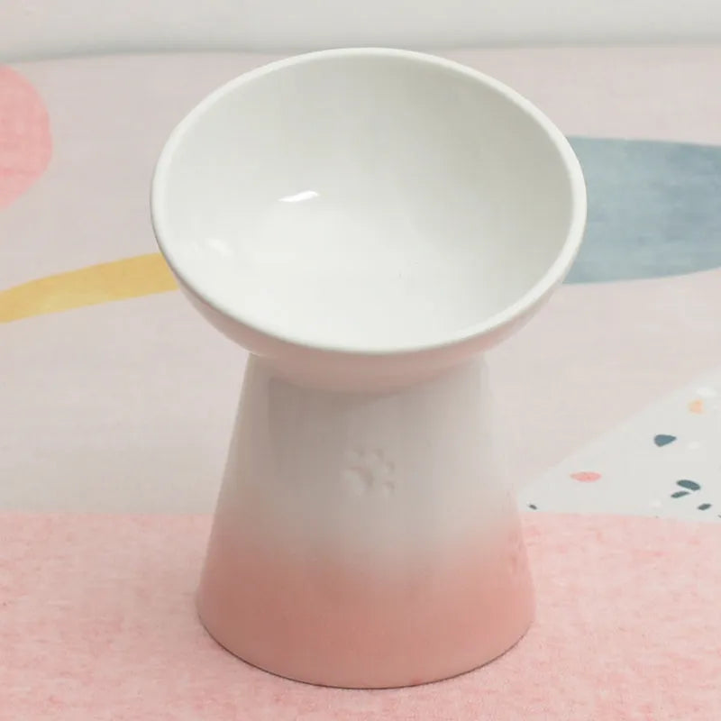 Ceramic pet bowl with anti-tumble design and raised chin support for cats and dogs