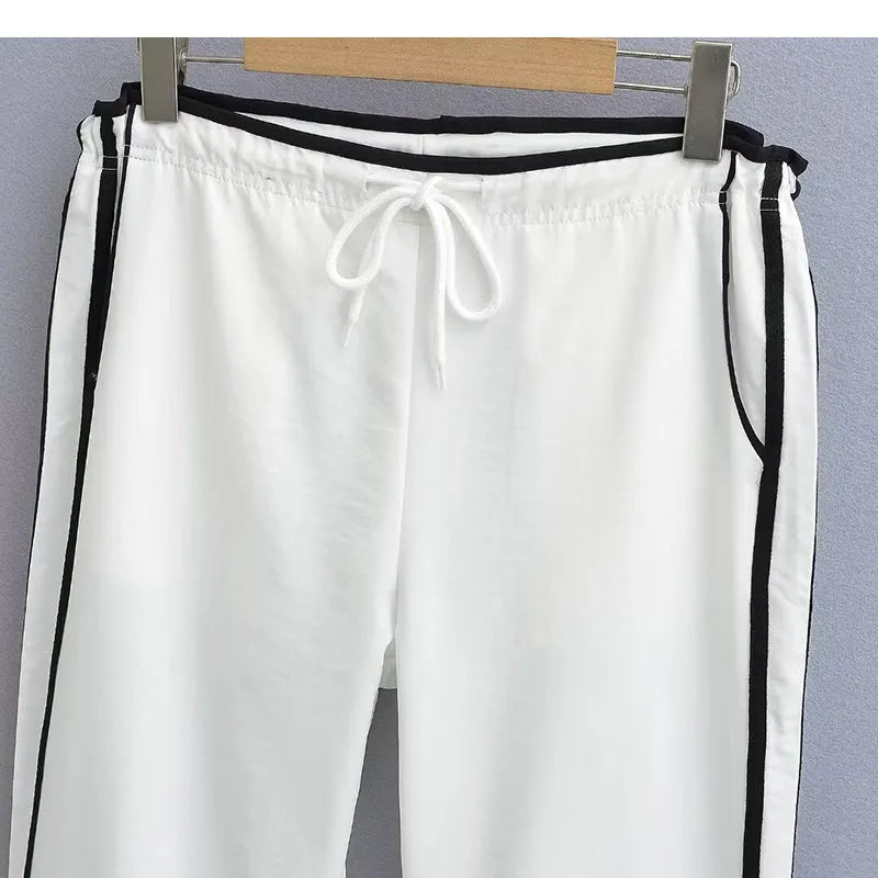 Women's slim-fit drape trousers in thin fabric with low waist and straight leg