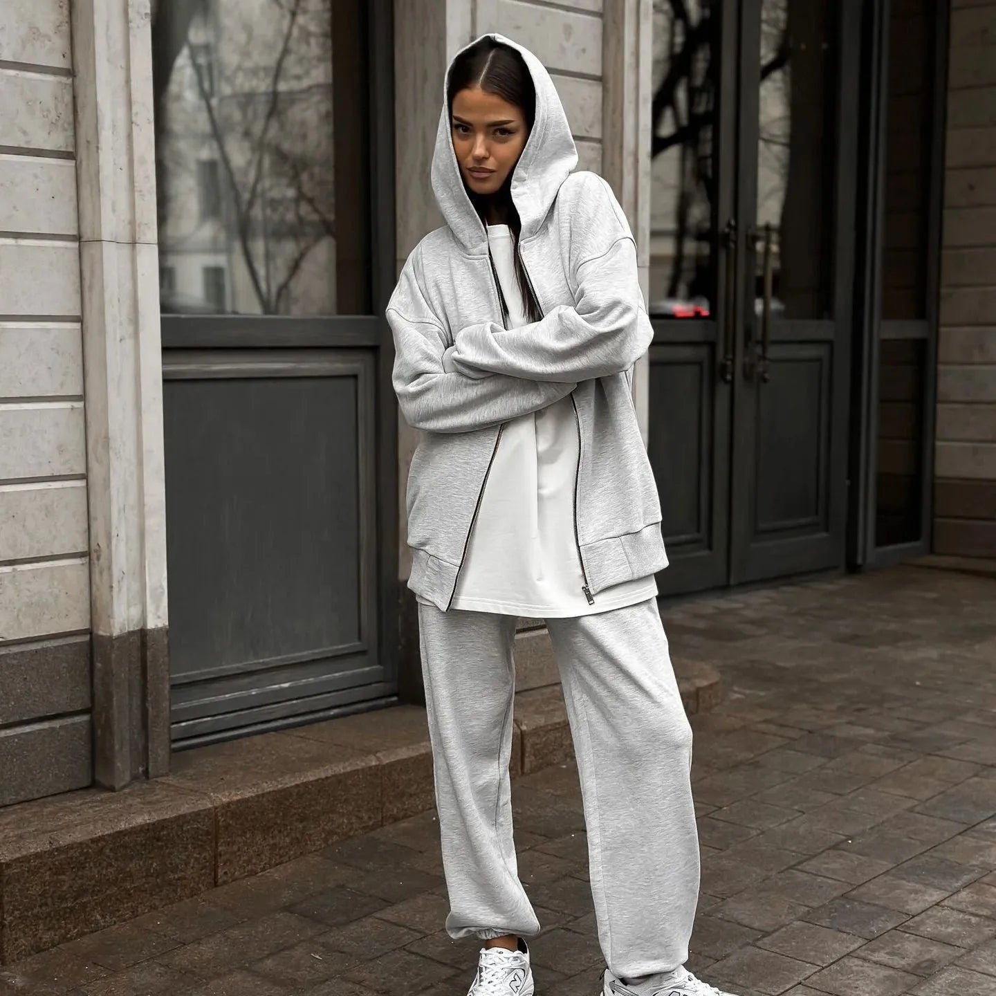 Loose fit red polyester street style coat and trousers two-piece set on a hanger