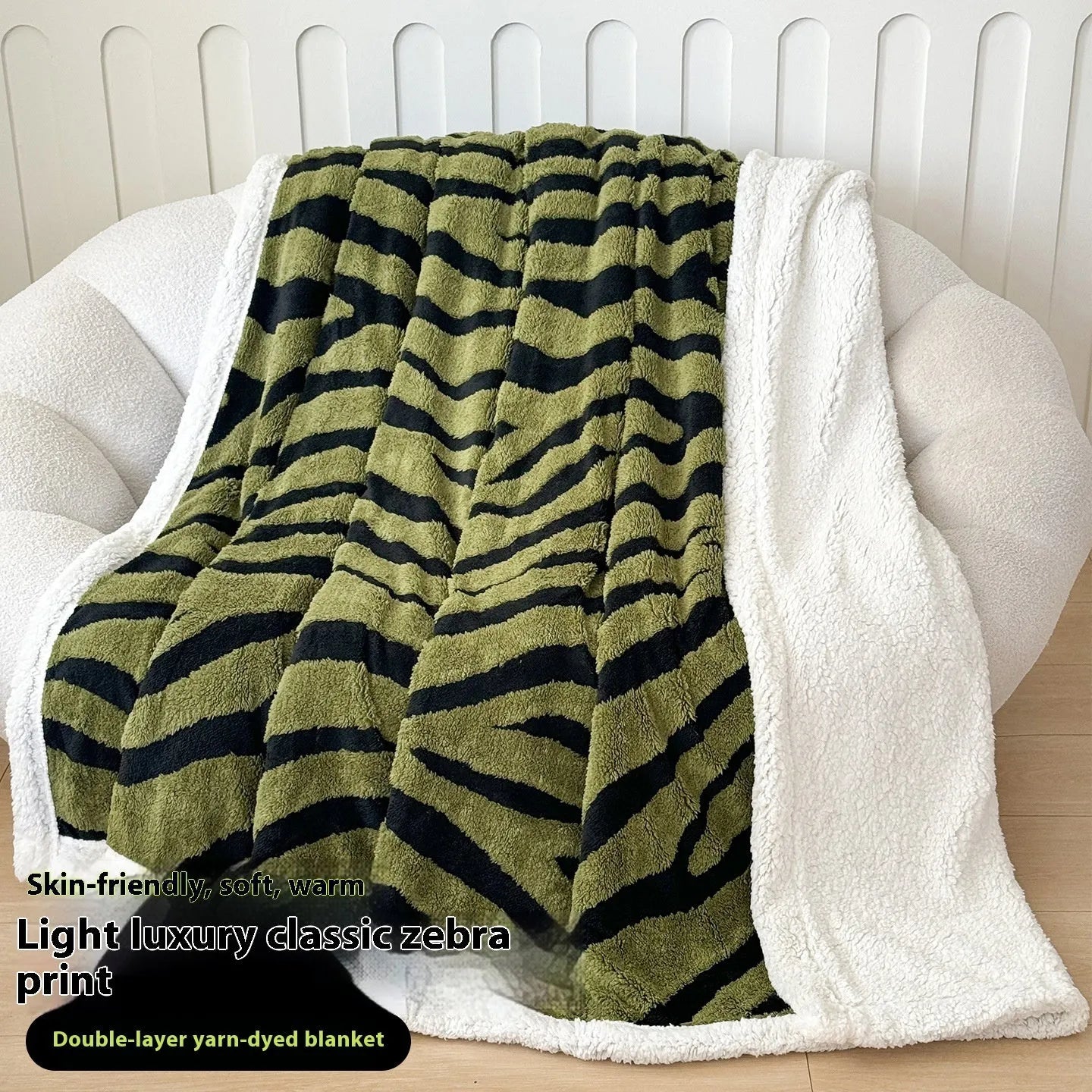 Double-layer Jacquard taffeta blanket with leopard print design in camel colour folded to show texture and pattern detail