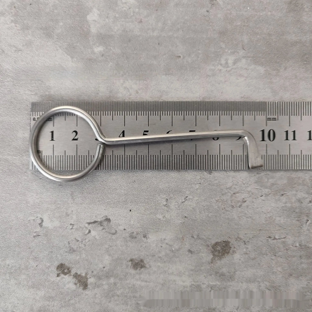 Two alloy steel wrench tools from a portable household repair set.