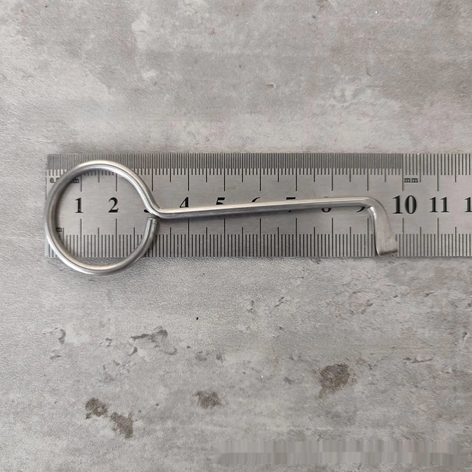 Two alloy steel wrench tools from a portable household repair set.
