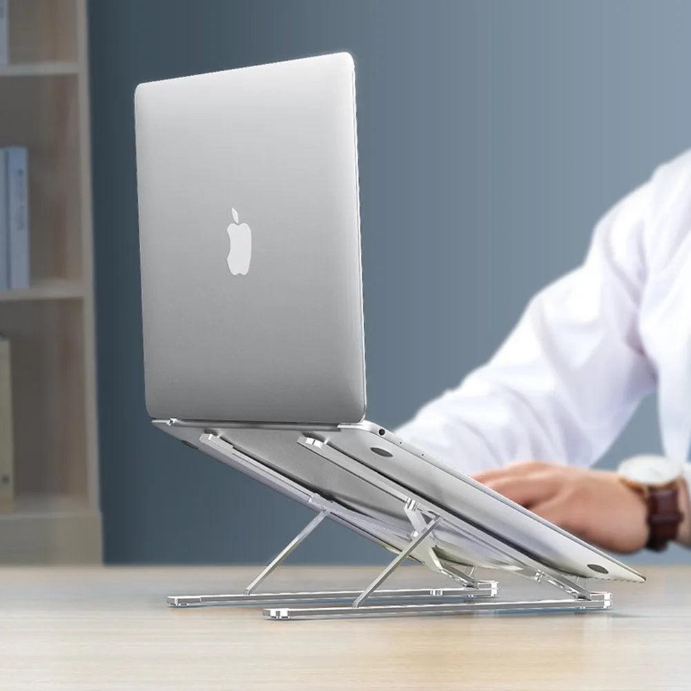 Aluminium alloy foldable laptop stand shown adjusted to different heights with laptop and tablet