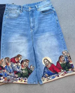 Men's blue cotton shorts with Jesus printed design on back pocket showing tapered fit