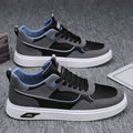 Men's low-top canvas board shoes in black with mesh lining and leather stitching detail
