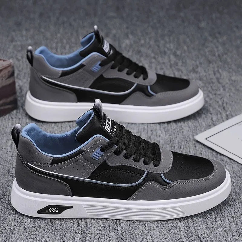Men's low-top canvas board shoes in black with mesh lining and leather stitching detail