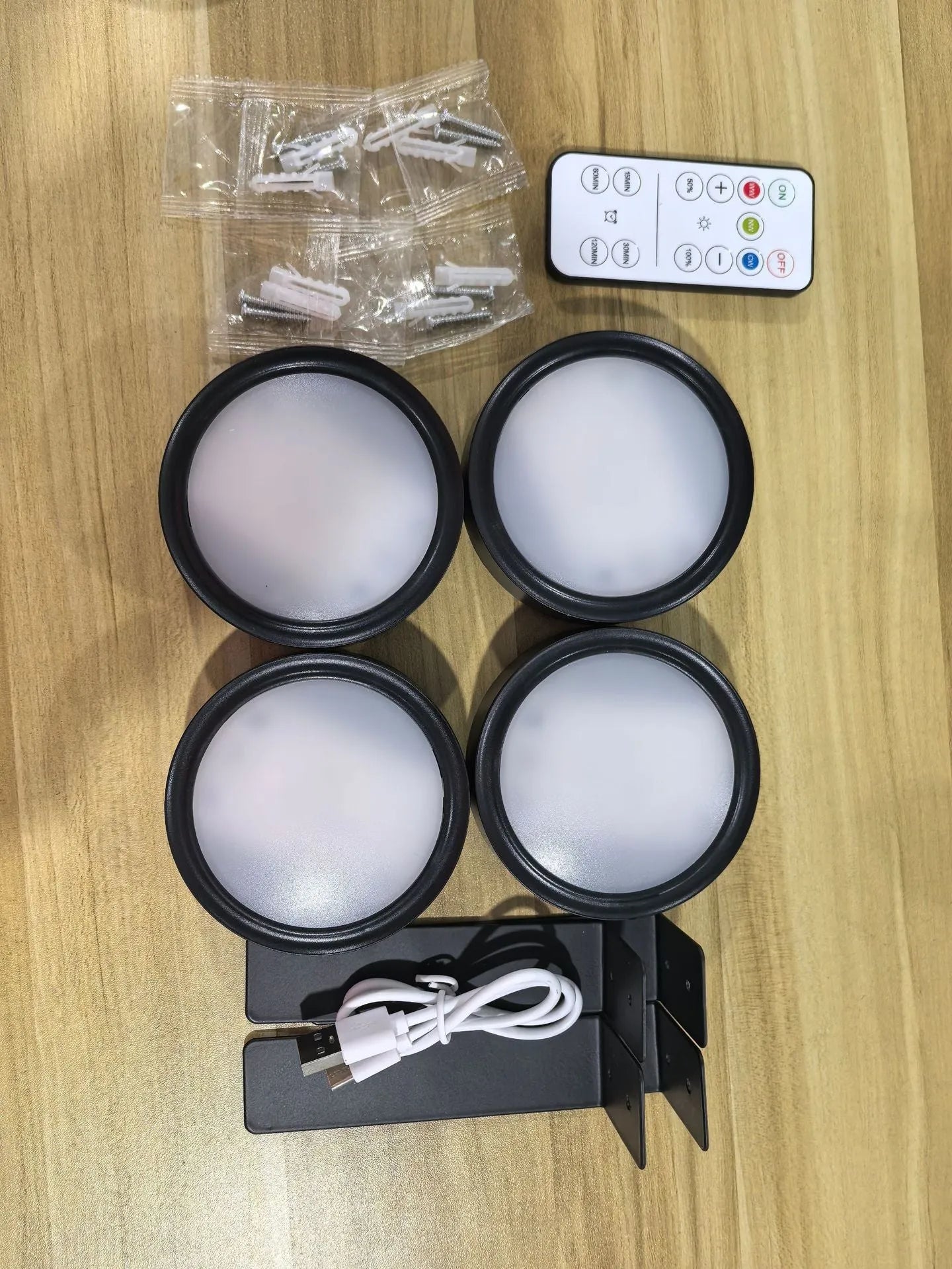 Wireless LED painting lamp with magnetic charging and remote control in black, white or gold finish