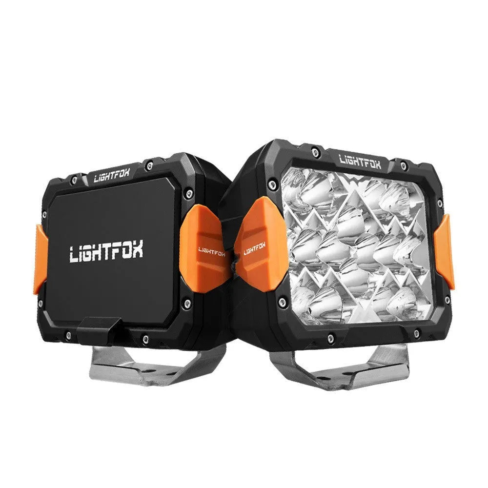 A pair of black aluminium LED front bumper lights for off-road vehicle retrofit.
