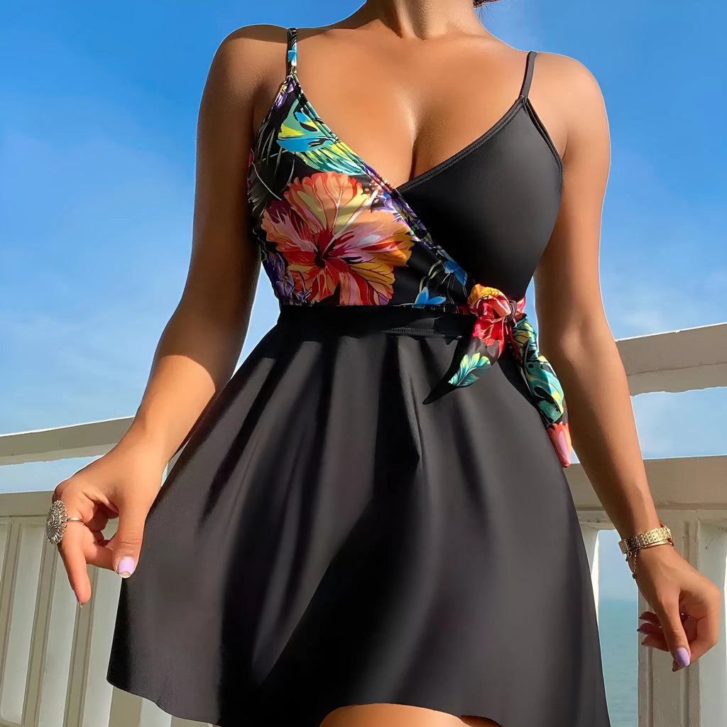 Black women's high-waist bikini briefs with a printed split design on a mannequin.