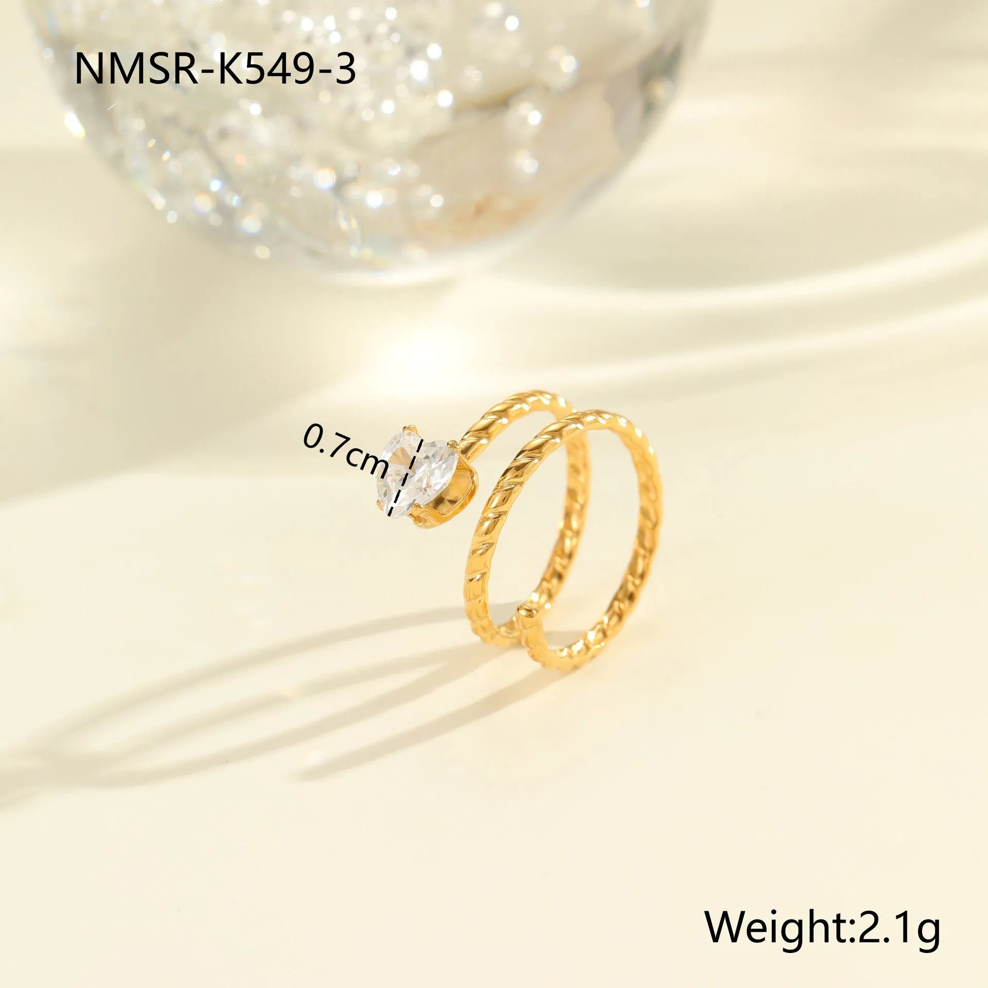 Gold electroplated stainless steel ring with zircon geometric design and open mouth adjustable fit