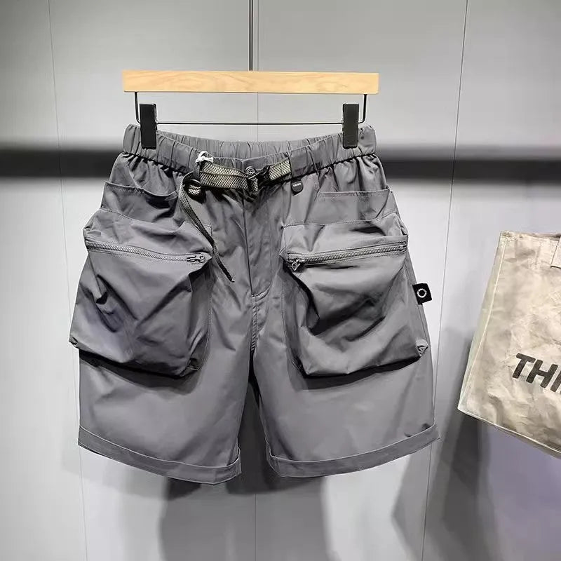 Men's black loose fitting workwear shorts with pockets, above-the-knee length with straight leg design