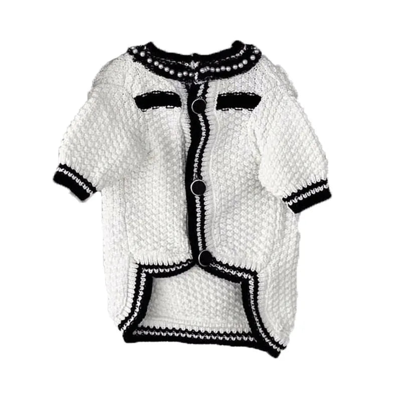 Korean-style white puppy sweater with pearl collar on small dog showing princess cut design