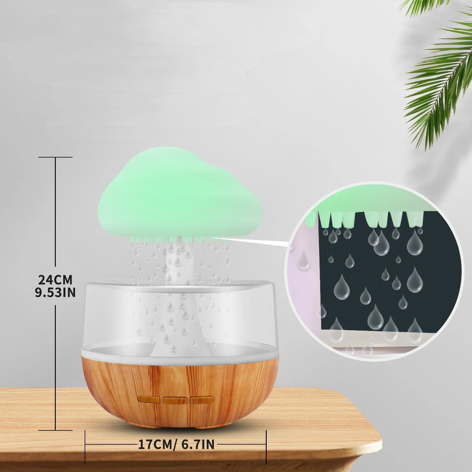 White raining cloud humidifier with night light and essential oil diffuser on table
