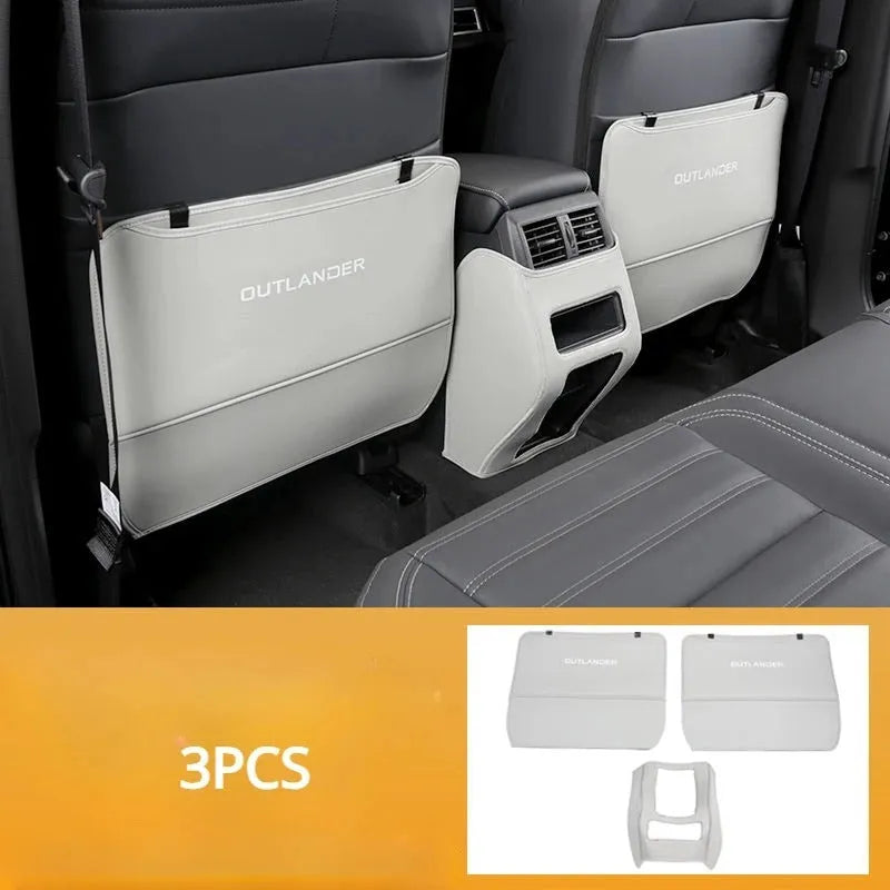 Set of three leather anti-kick pads for 2023 Mitsubishi Outlander seat and door armrest protection.