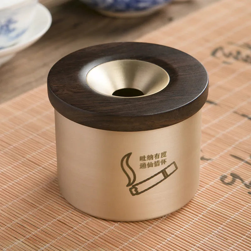 Retro-style solid copper ashtray with a wooden lid in black or red.