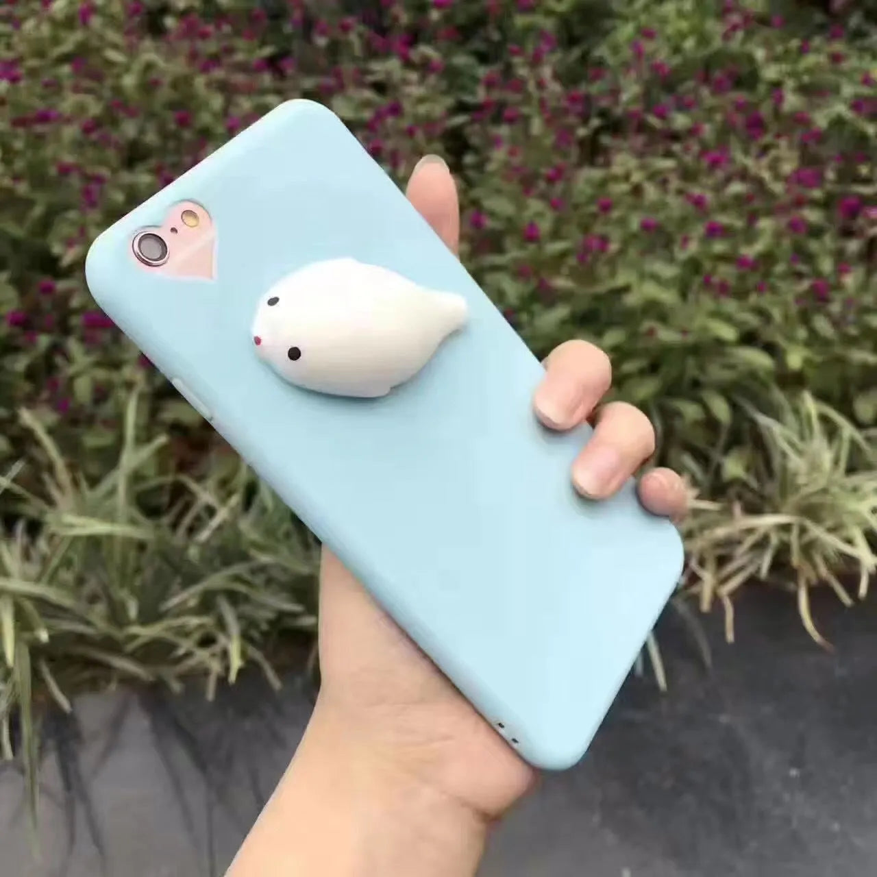 3D cartoon cat design silicone phone case for iPhone models on white background