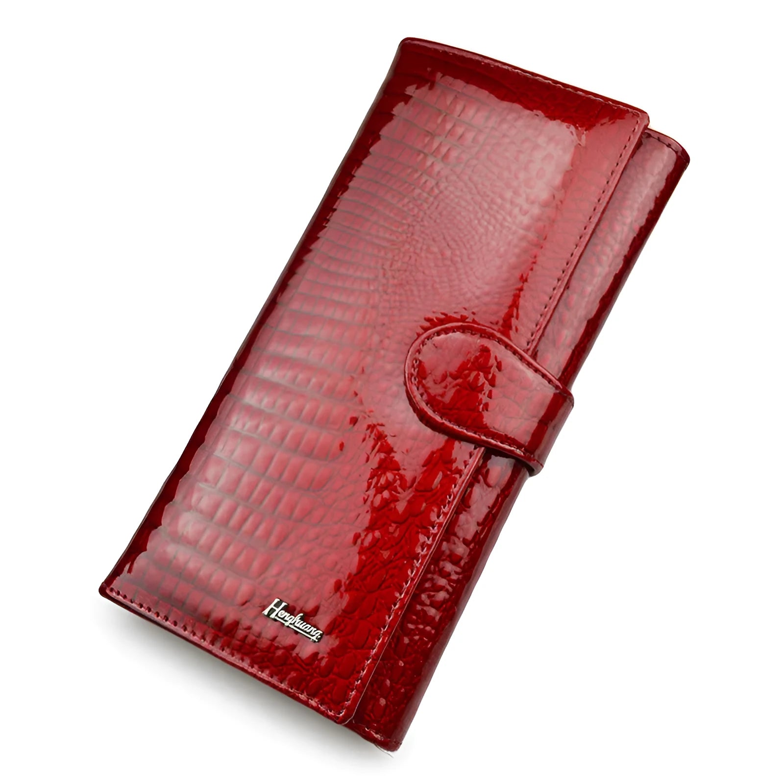 Women's leather coin purse with crocodile pattern texture in red colour showing pigskin lining