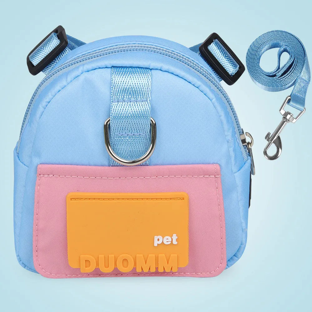 Blue adjustable dog backpack harness with storage compartments and breathable mesh panels