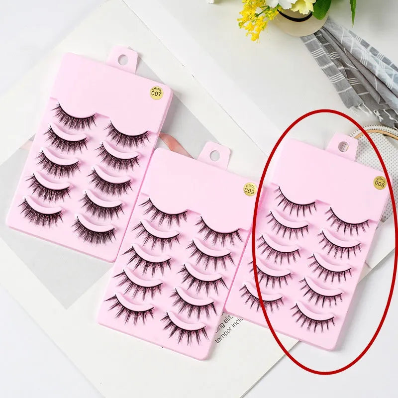 Set of five pairs of black wispy manga-style false eyelashes for anime cosplay and Korean makeup.