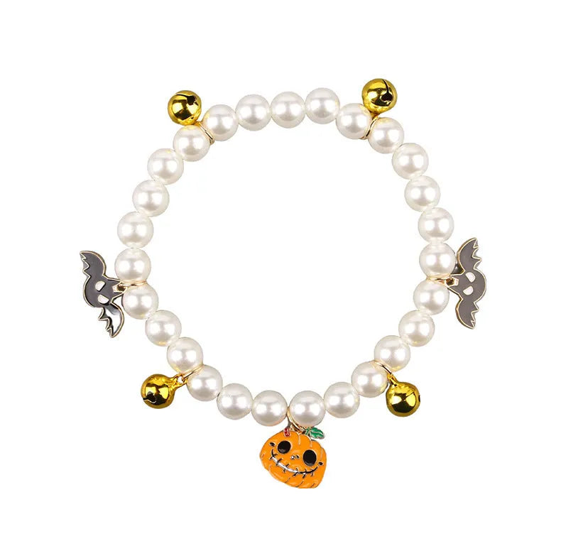 Halloween cat collar with simulated pearl necklace and purple ghost pumpkin ornament