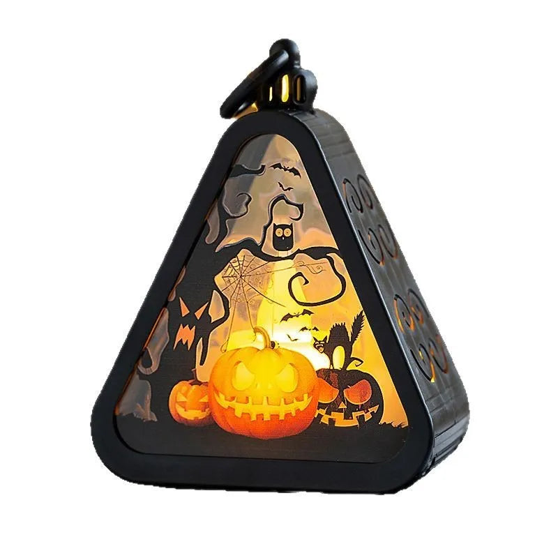 Portable Halloween pumpkin lamp decoration with plastic and glass construction measuring 8.9cm