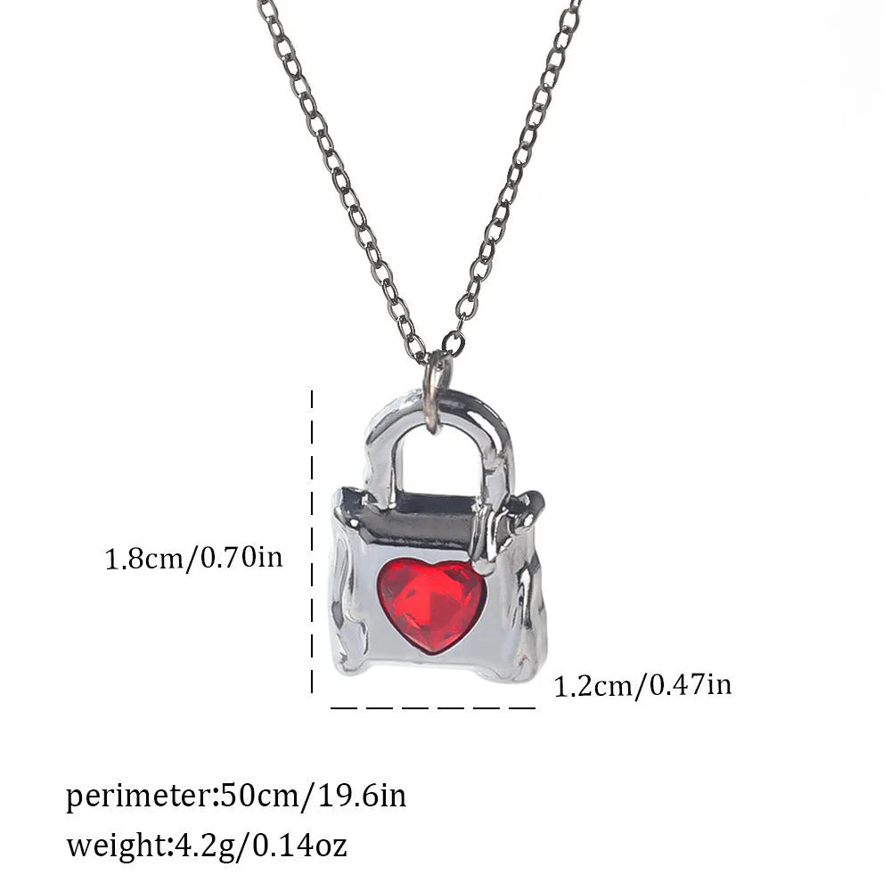 Dark style Halloween necklace for women with a choice of alloy bat, spider, or cross pendants on a chain.