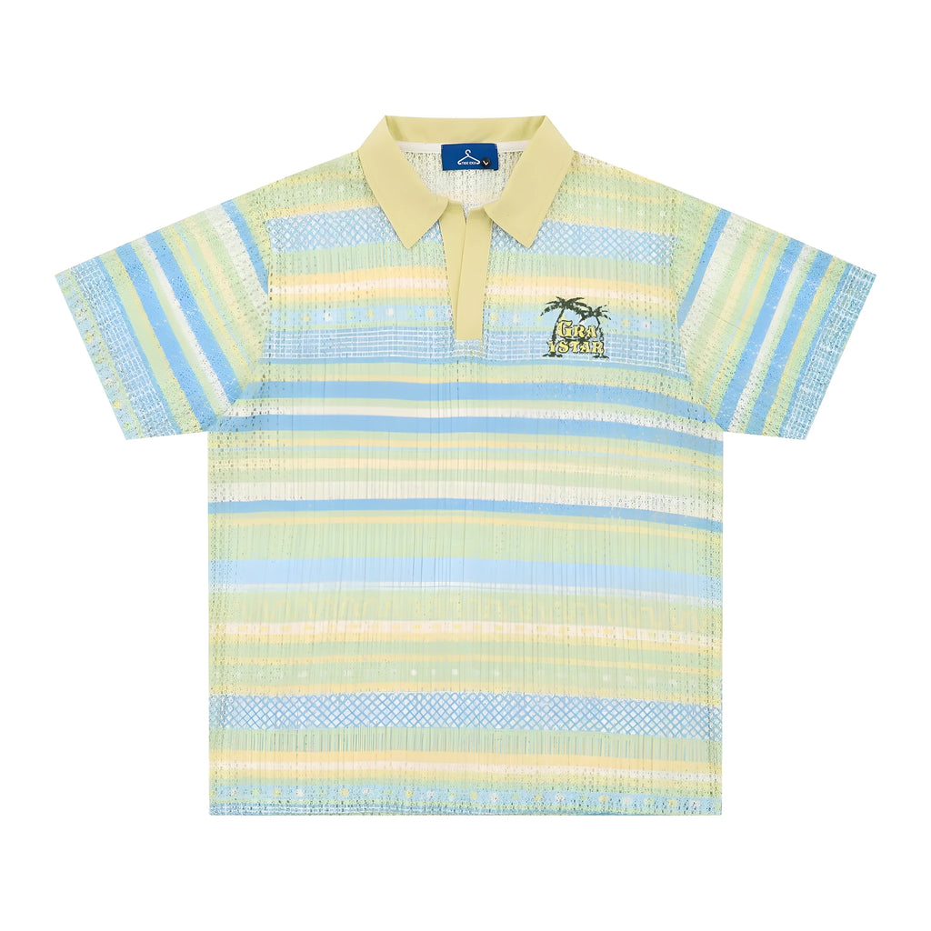 Man wearing a blue loose-fit printed casual short sleeve shirt made from elastic polyester fabric.