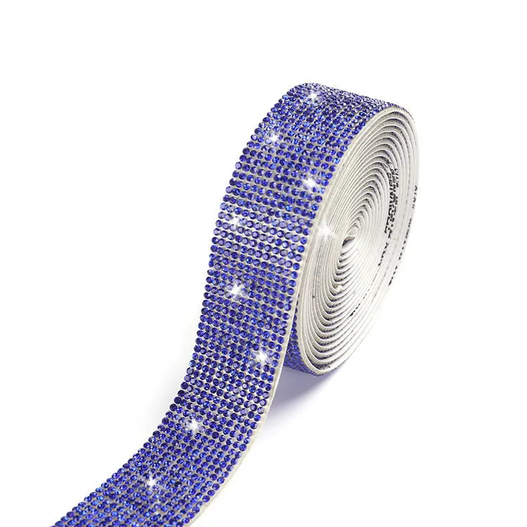 Self-adhesive glass rhinestone strip on a roll showing white and AB colour options.