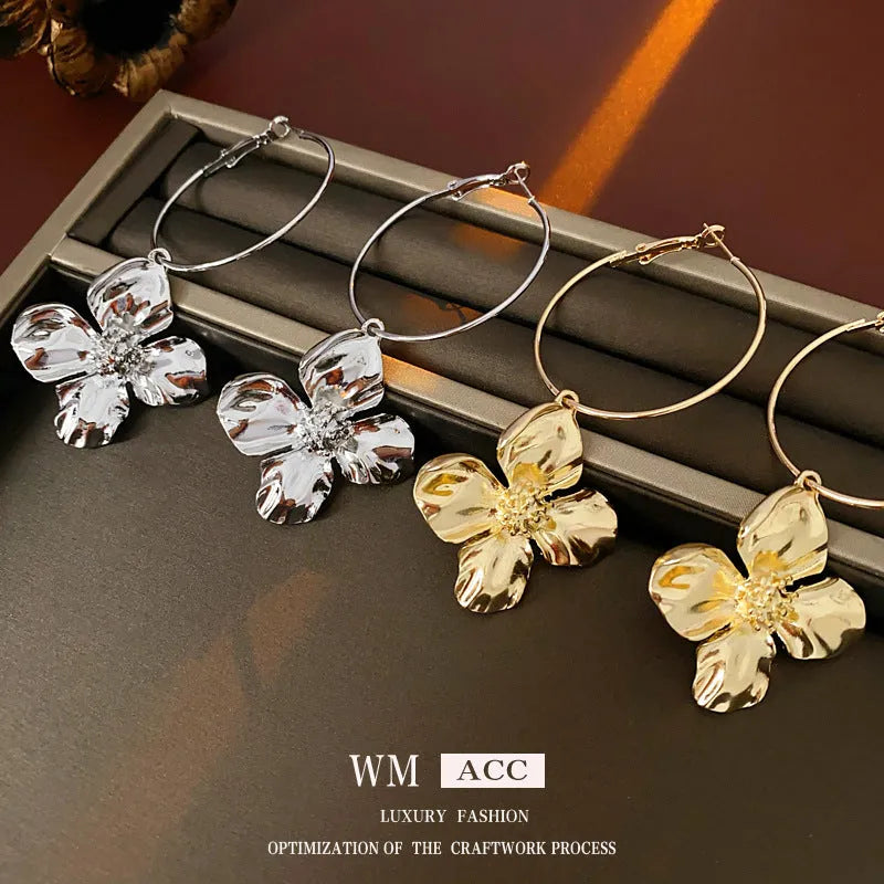 Silver Needle metal flower earrings in geometric design with electroplated gold or silver finish