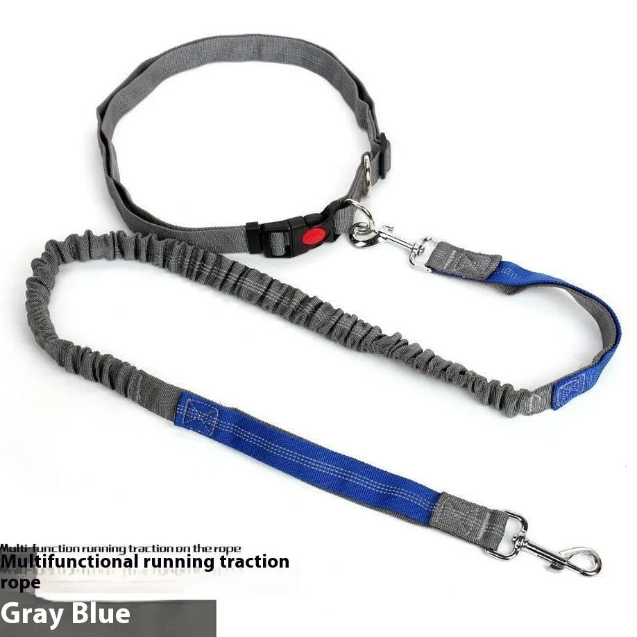 Grey and green reflective dog leash with elastic section shown on a table.