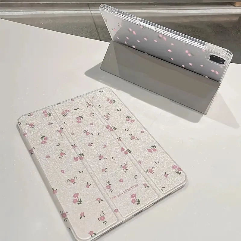 Transparent floral tri-fold tablet case with magnetic stand for iPad showing clear PC back and cartoon pattern
