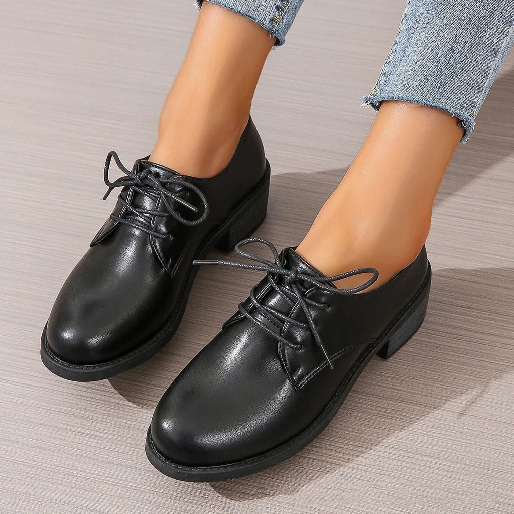 Black women's work shoes with thick chunky heel and low-top design