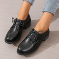 Black women's work shoes with thick chunky heel and low-top design