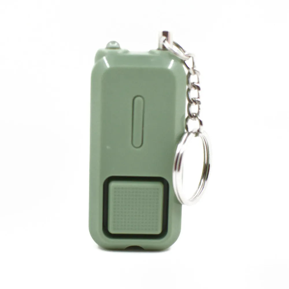 ZQ-202 personal safety alarm in multiple colours showing compact 65x30x12mm dimensions