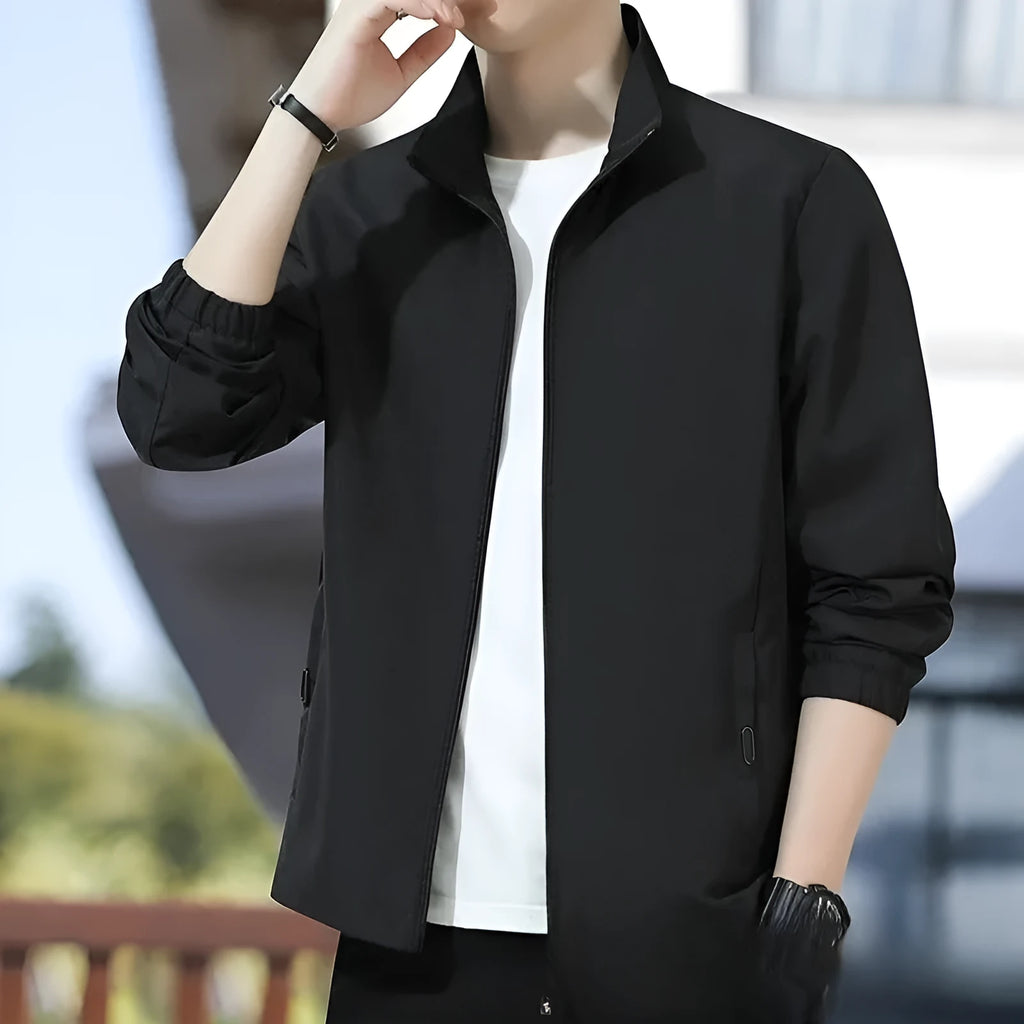 Men's Korean style loose lapel autumn jacket in black with zipper pockets