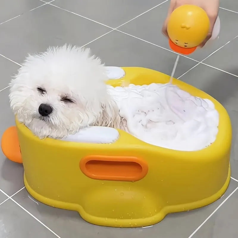 Blue PVC duck-shaped bathtub for washing a dog or cat at home