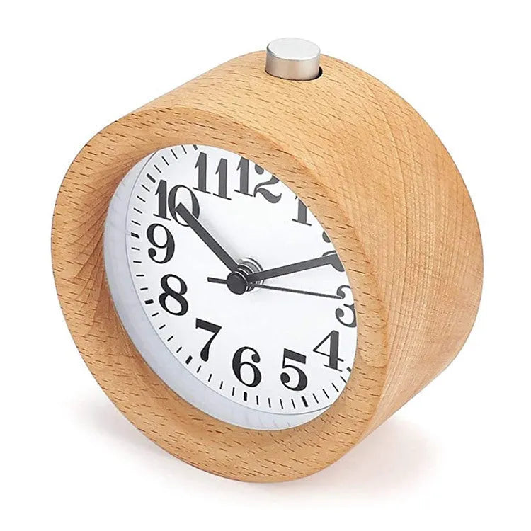 Solid beech wood traditional alarm clock with silent snooze function measuring 9.5cm in diameter