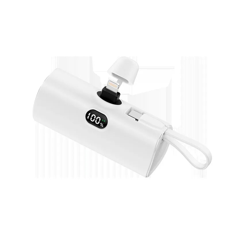 Compact rectangular power bank with digital display, showing colour options: black, white, pink, blue, green.