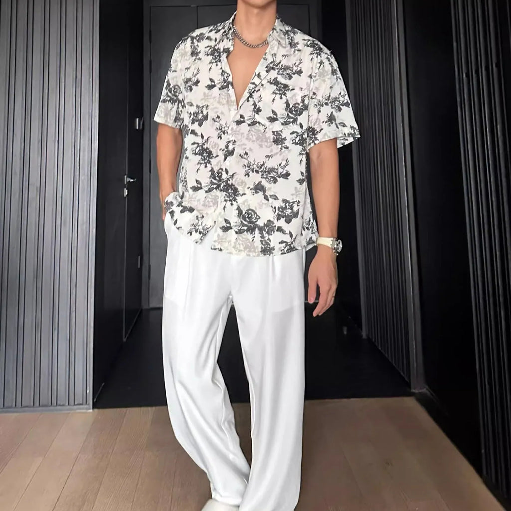 Loose casual short sleeve shirt with floral pattern in black or white colour options