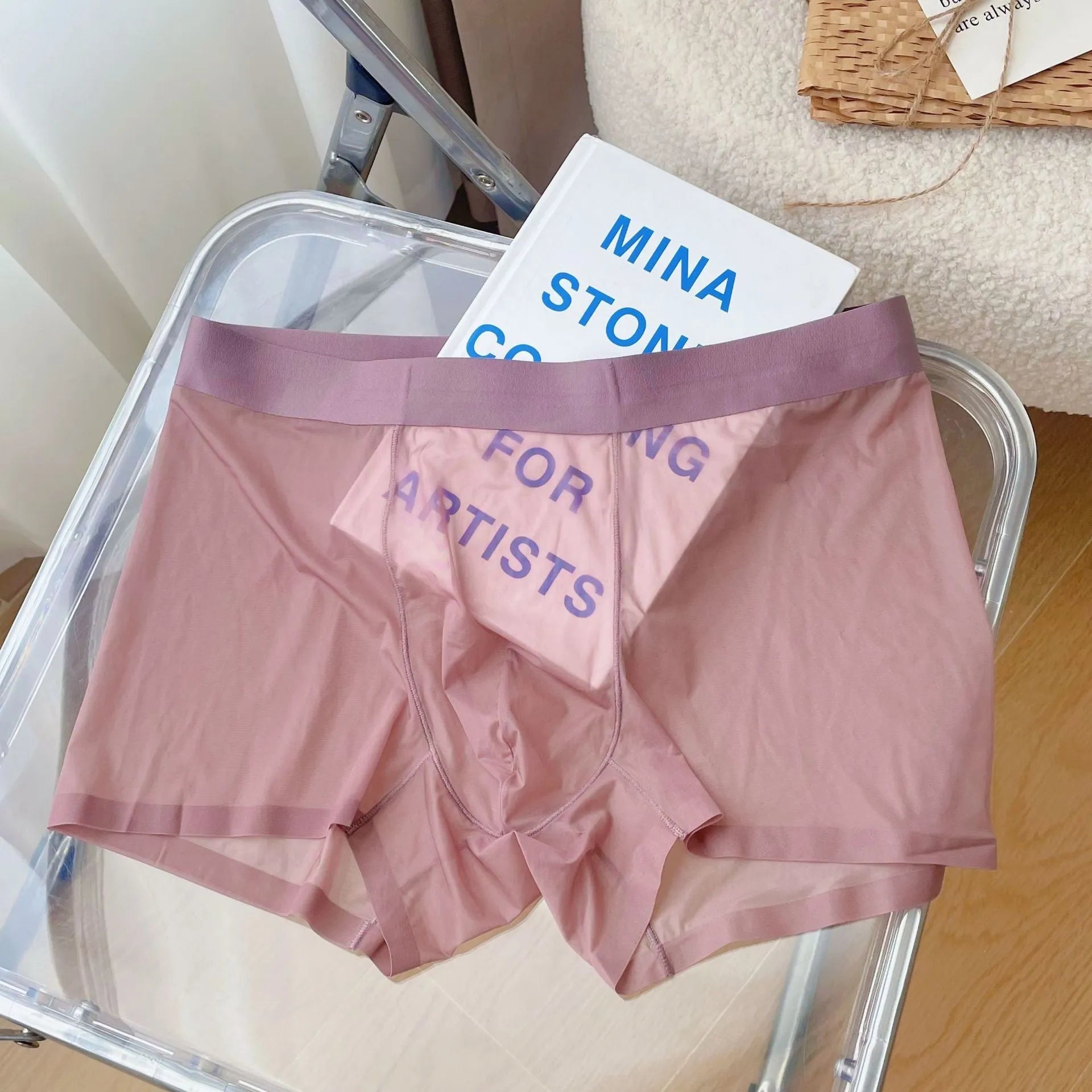 Men's seamless boxer shorts in quick-drying nylon fabric, shown in multiple colours including rock ash and Congo red