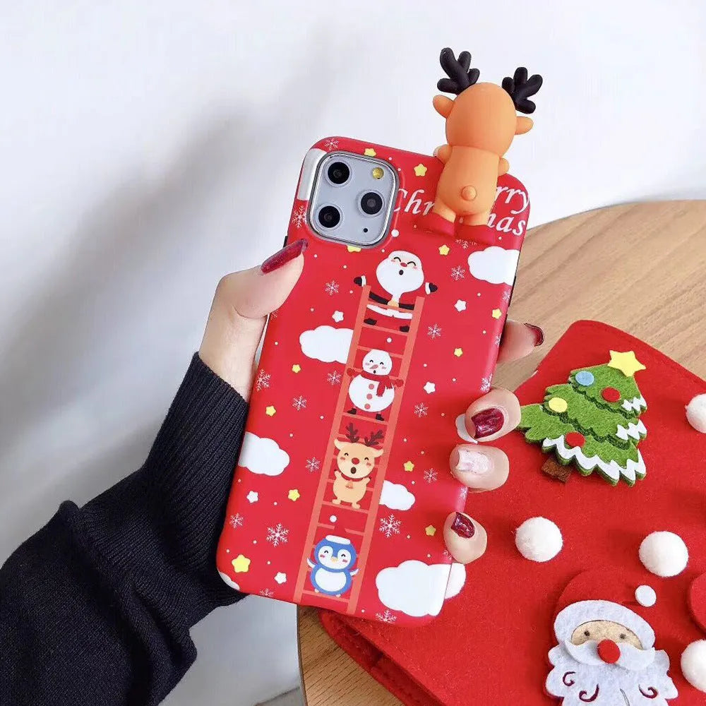 Red Christmas-themed silicone phone case on an iPhone, showing festive back cover design.