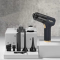 Black wireless handheld car and home vacuum cleaner with multiple nozzle attachments