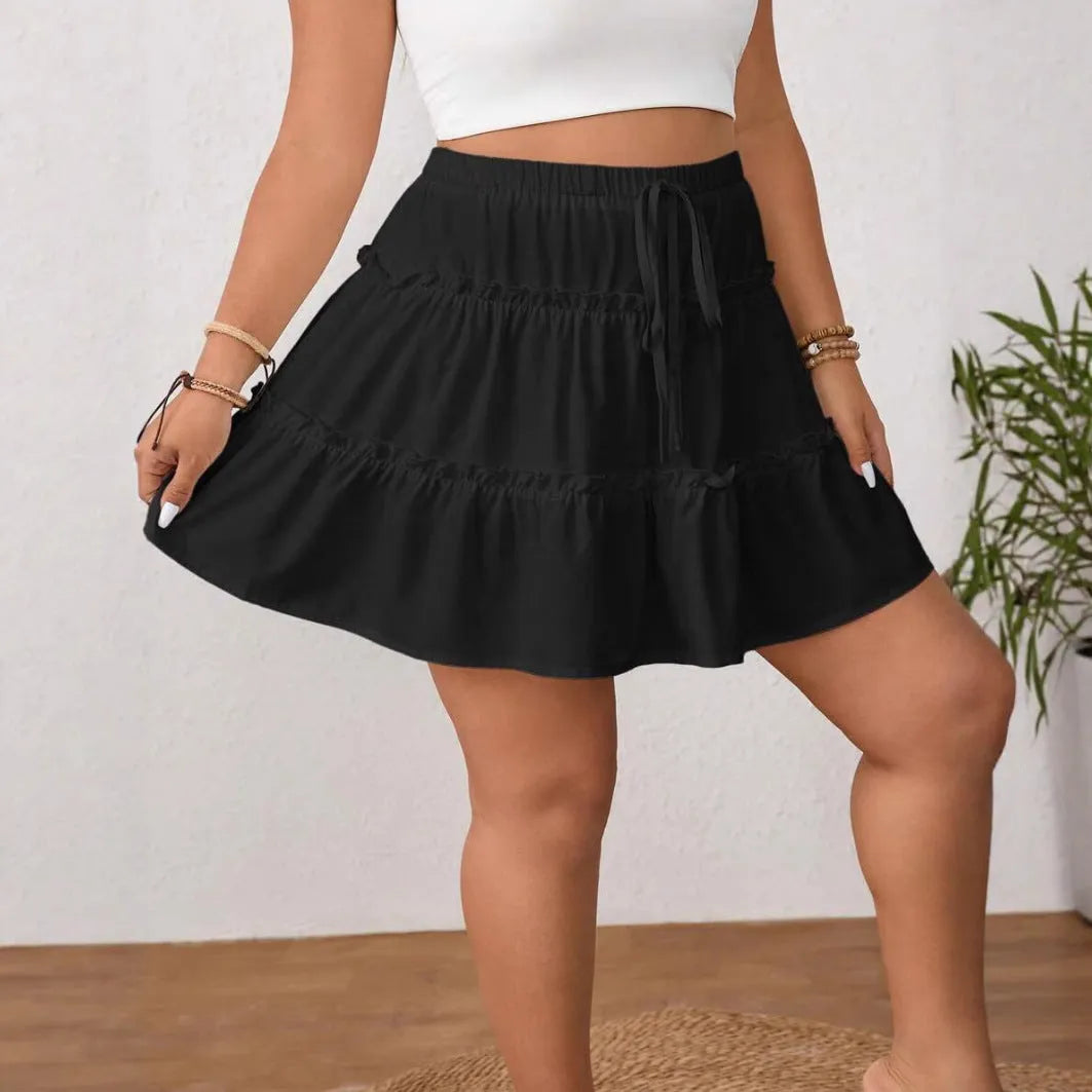 Women's white pleated A-line skirt with lace-up front detail in milk silk sanding fabric
