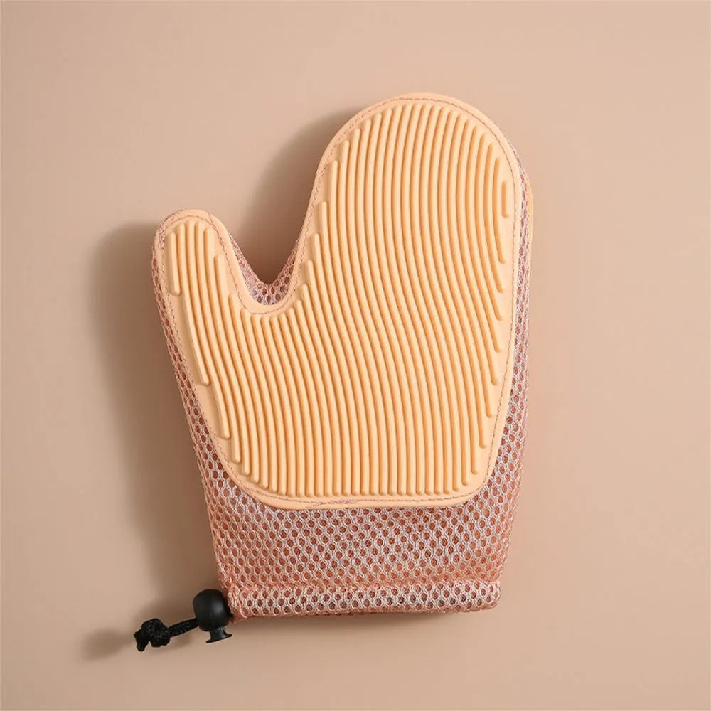 Dark blue pet hair removal glove made of mesh and TPR rubber for grooming dogs and cats.