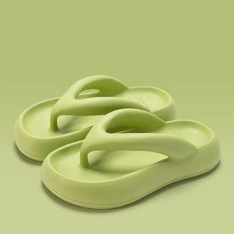 Solid colour EVA thong sandals with thick sole and a bow on the strap.