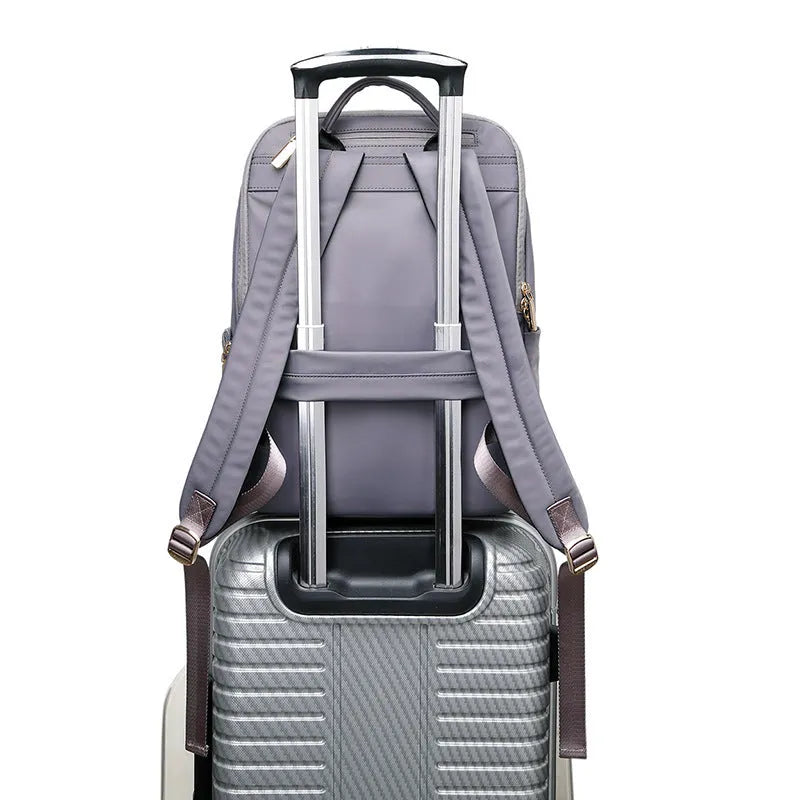 Large capacity black Oxford cloth women's backpack with shoulder straps.