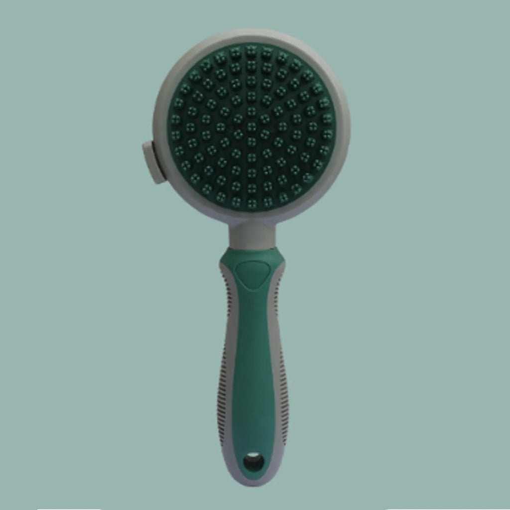 Double-sided cat brush with smooth brush and flea comb on reverse sides, showing release button mechanism